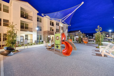 Playground area at night with bright blue skies